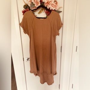 Brown dress. Pretty plain and simple.